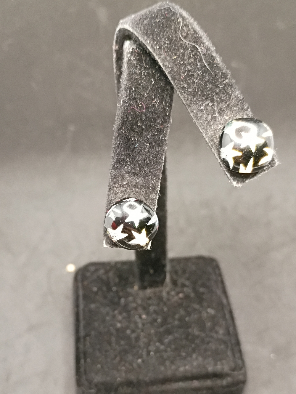 Black Glass Star Stud Earrings with Silver Accents